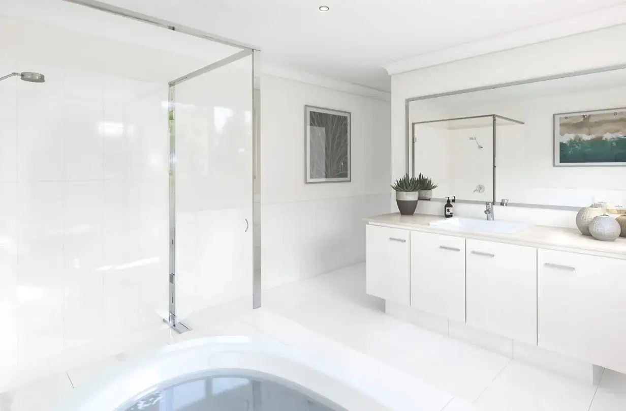 Ensuite with frameless shower, freestanding-style bath and double vanity