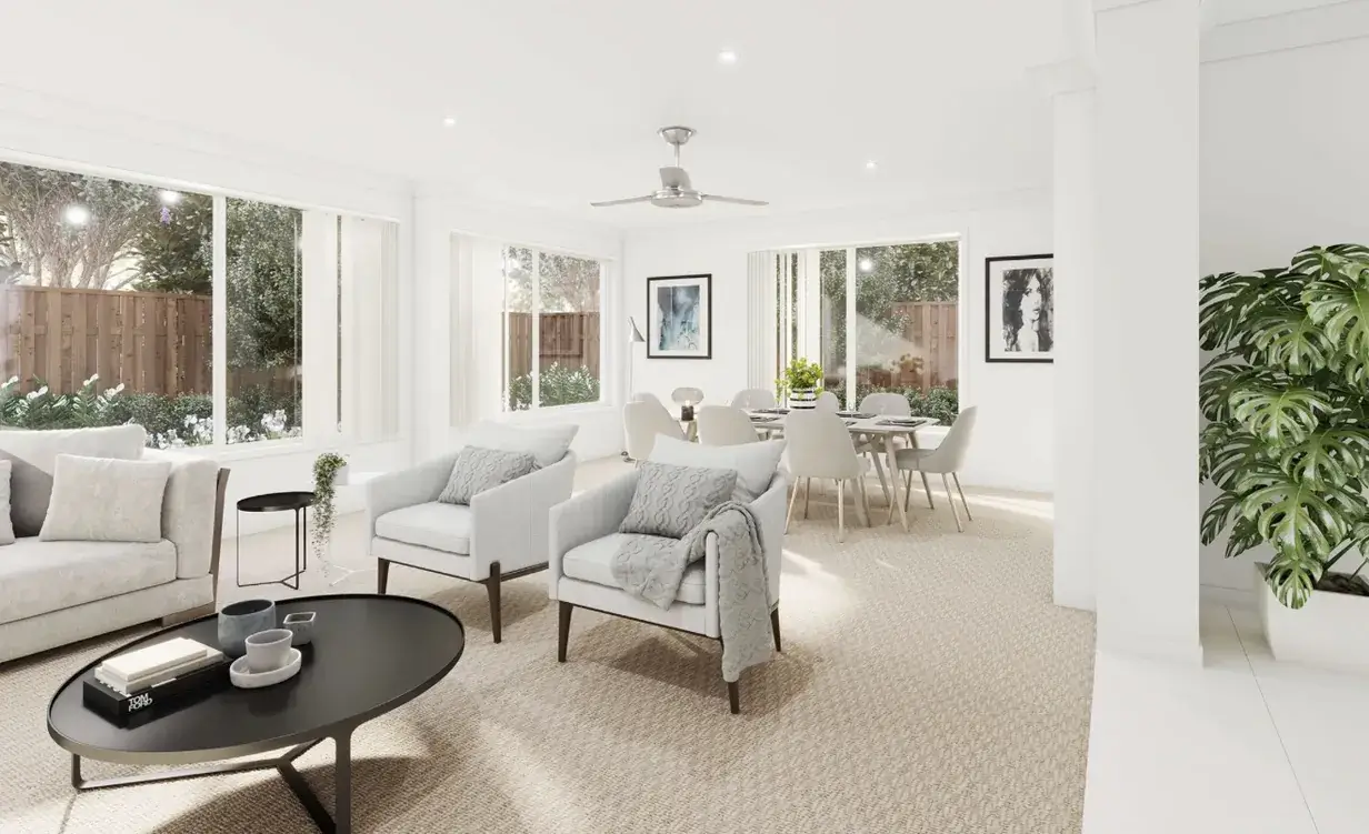Neutral-toned living and dining area with plantation-style windows and ceiling fan